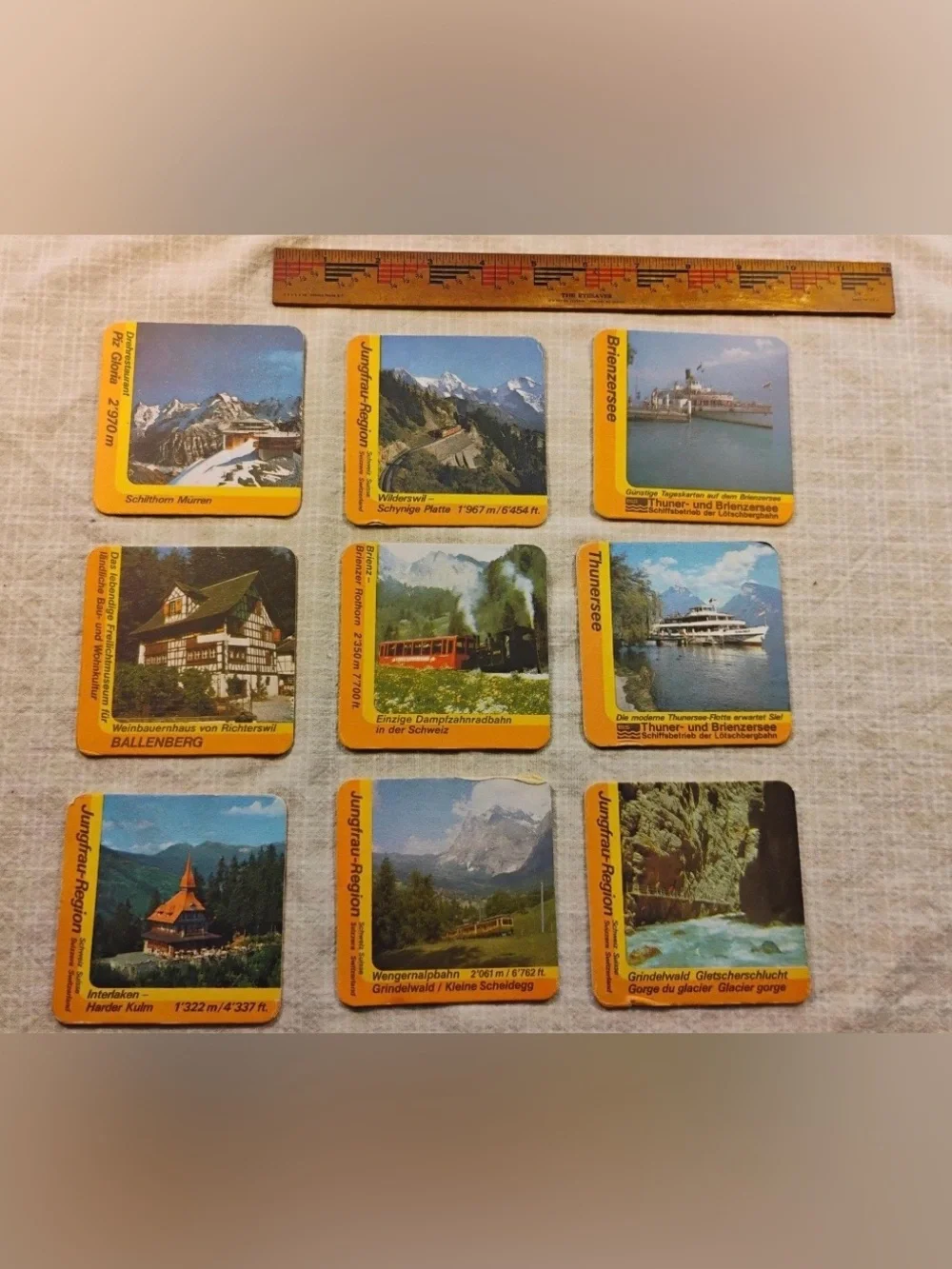 Set of 12 Rugan Brau Beer Mats, Switzerland Scenes